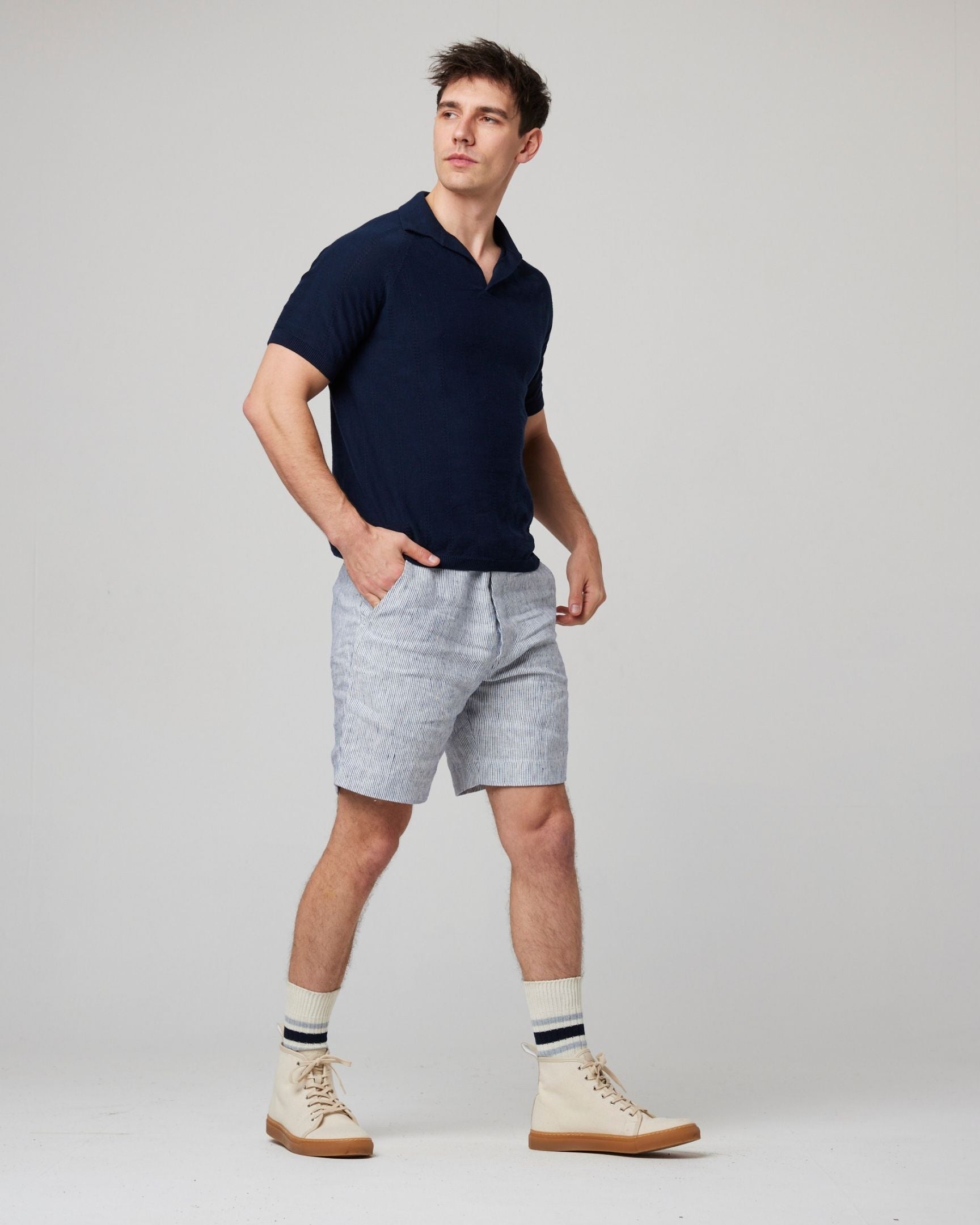 Image of model wearing Alma Polo shirt. 