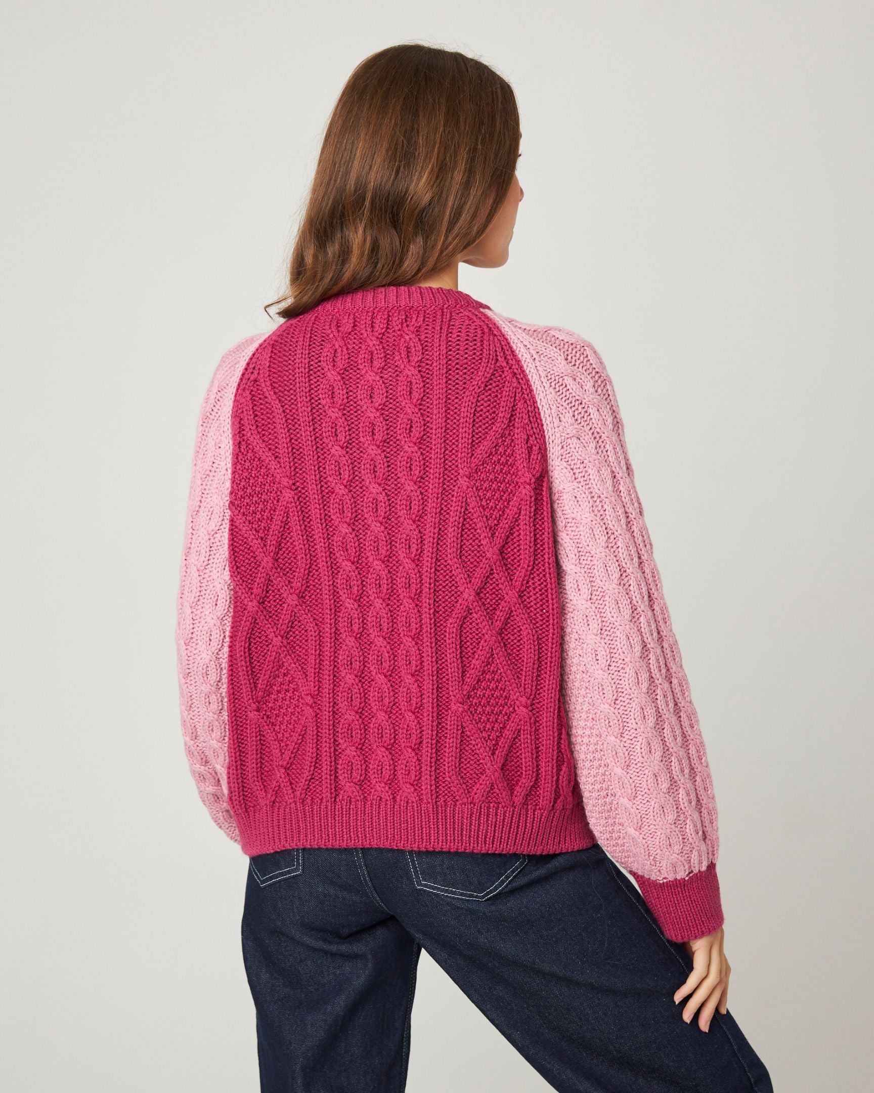 Image of model wearing Beckett Cable Knit Cardigan. 