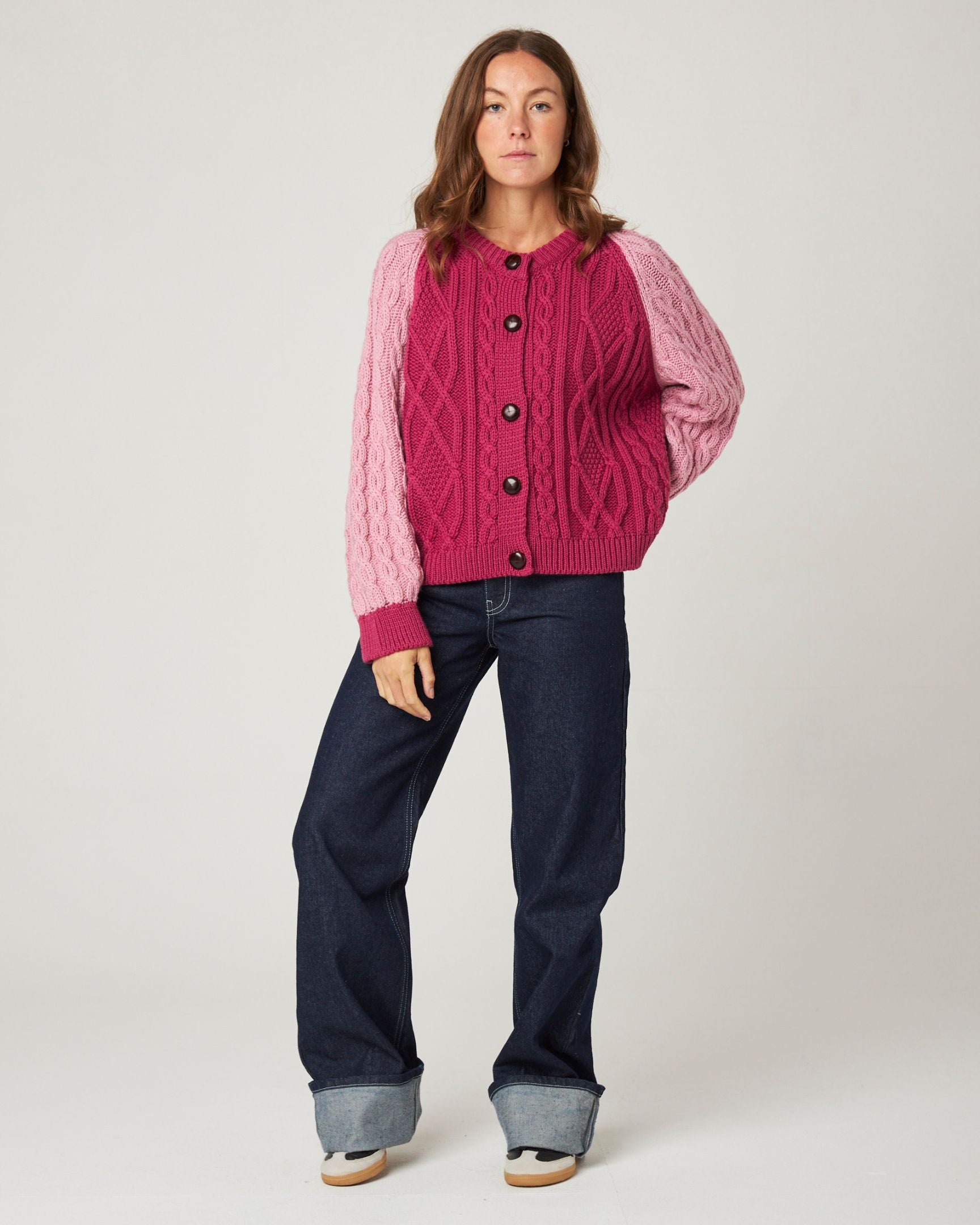 Image of model wearing Beckett Cable Knit Cardigan. 