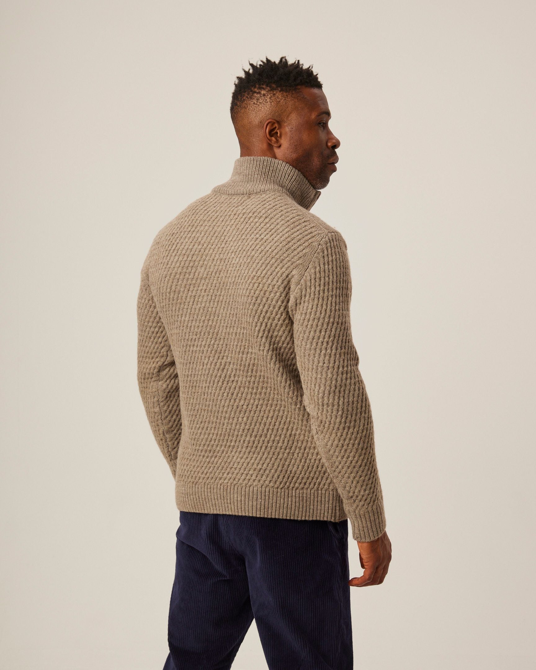 Image of model wearing Birchall Quarter Zip Jumper. 
