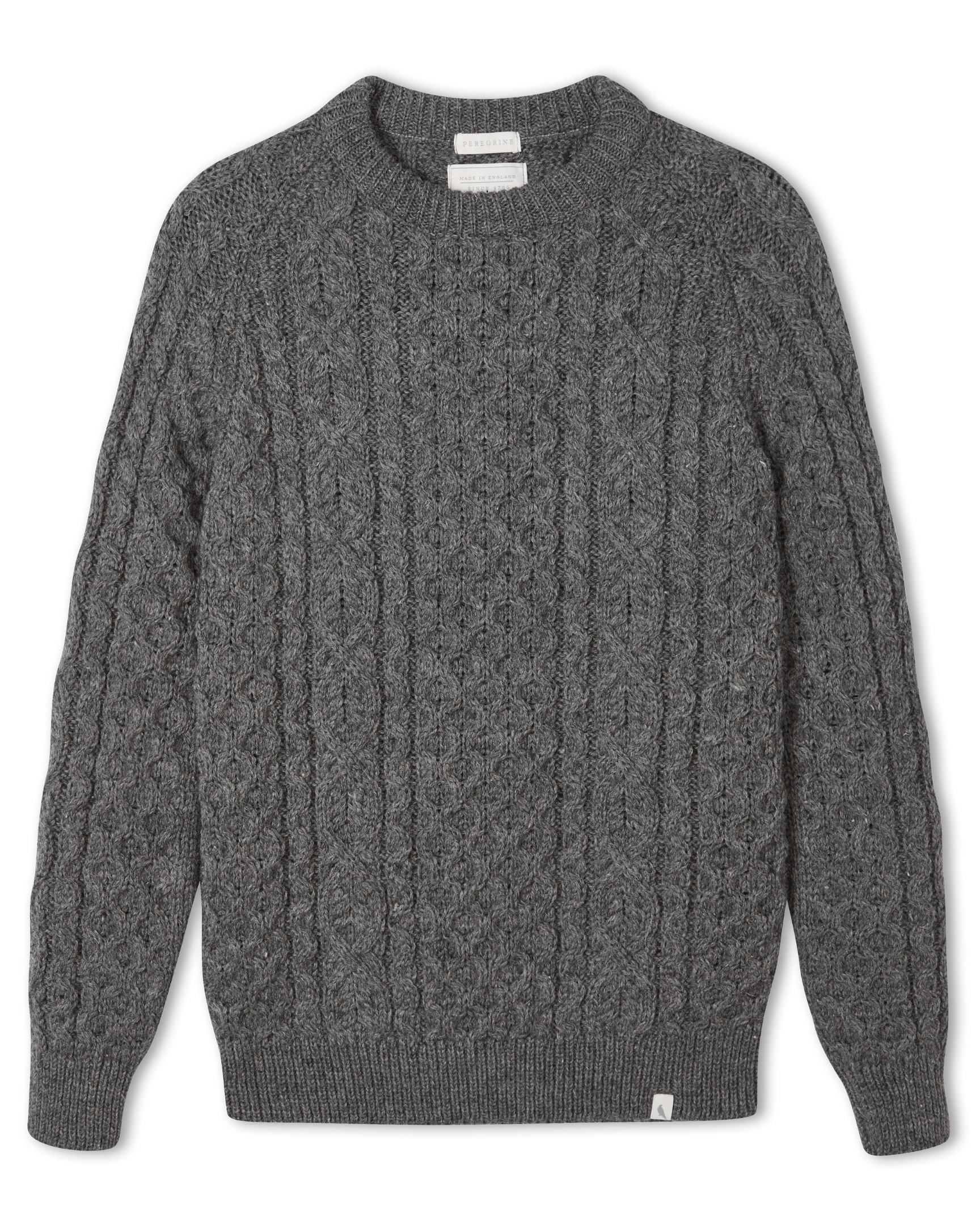 Image of model wearing Hudson Aran Jumper. Model is 6ft1in, chest size 38in and wearing size Medium
