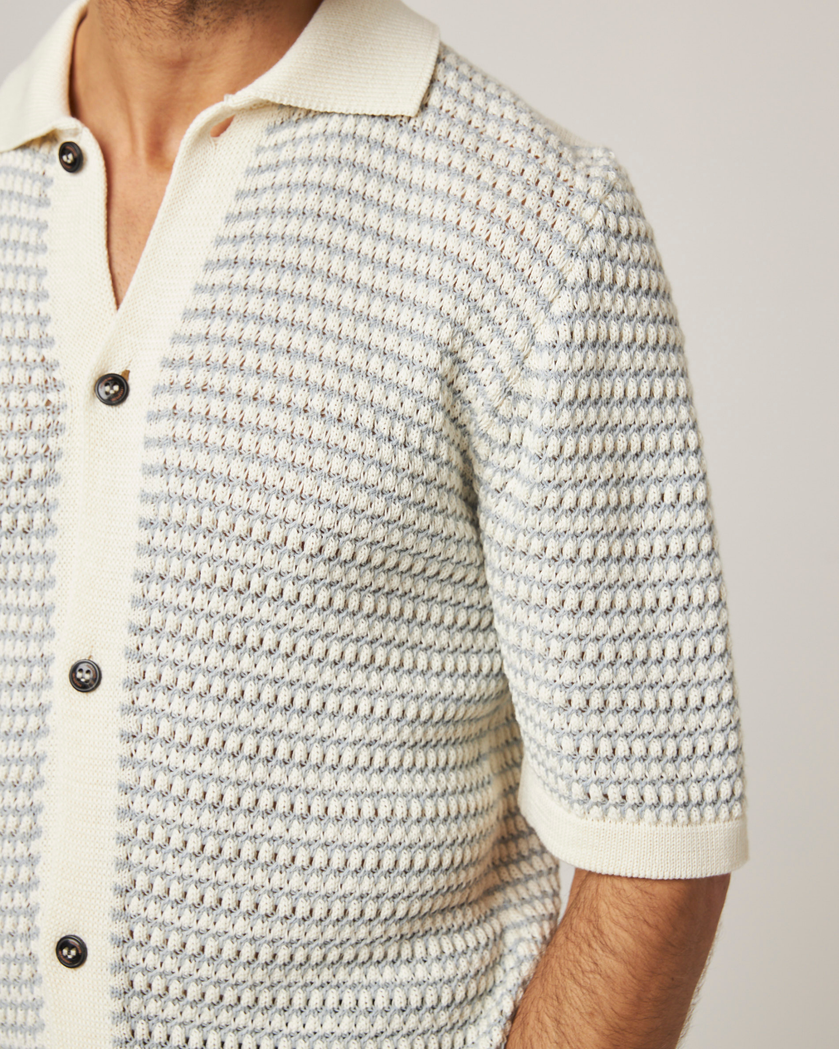 Image of model wearing Island Crochet Shirt. 