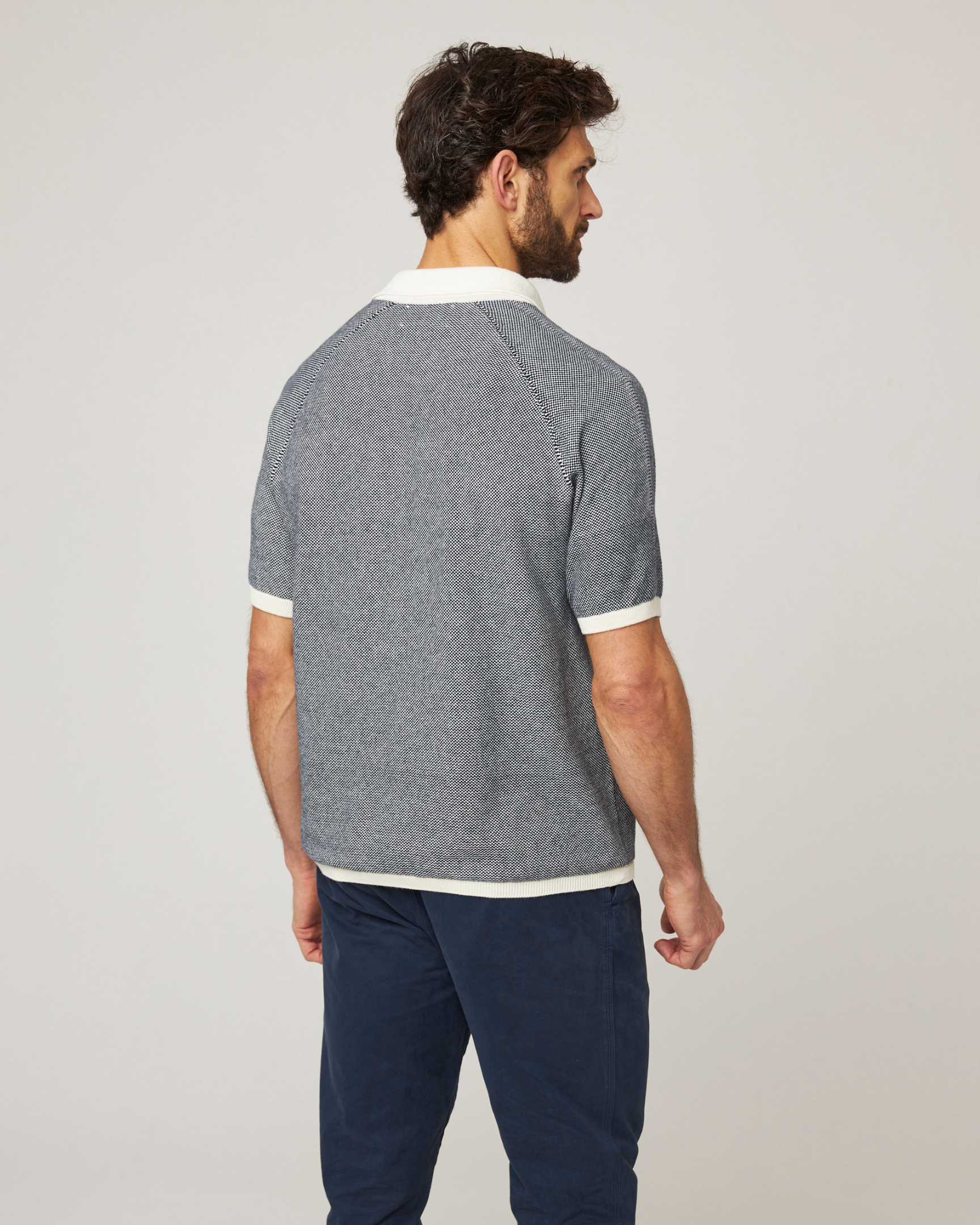 Image of model wearing Lynton Polo Shirt. 