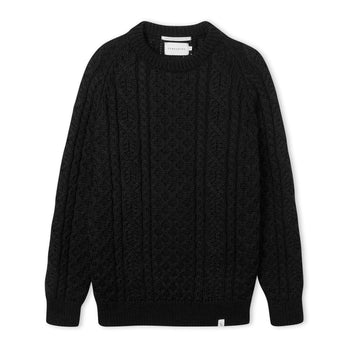 Image of model wearing Hudson Aran Jumper. Model is 6ft1in, chest size 38in and wearing size Medium