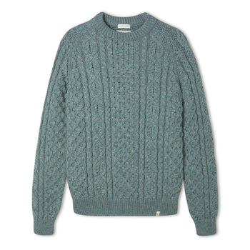 Image of model wearing Hudson Aran Jumper. Model is 6ft1in, chest size 40in and wearing size Large