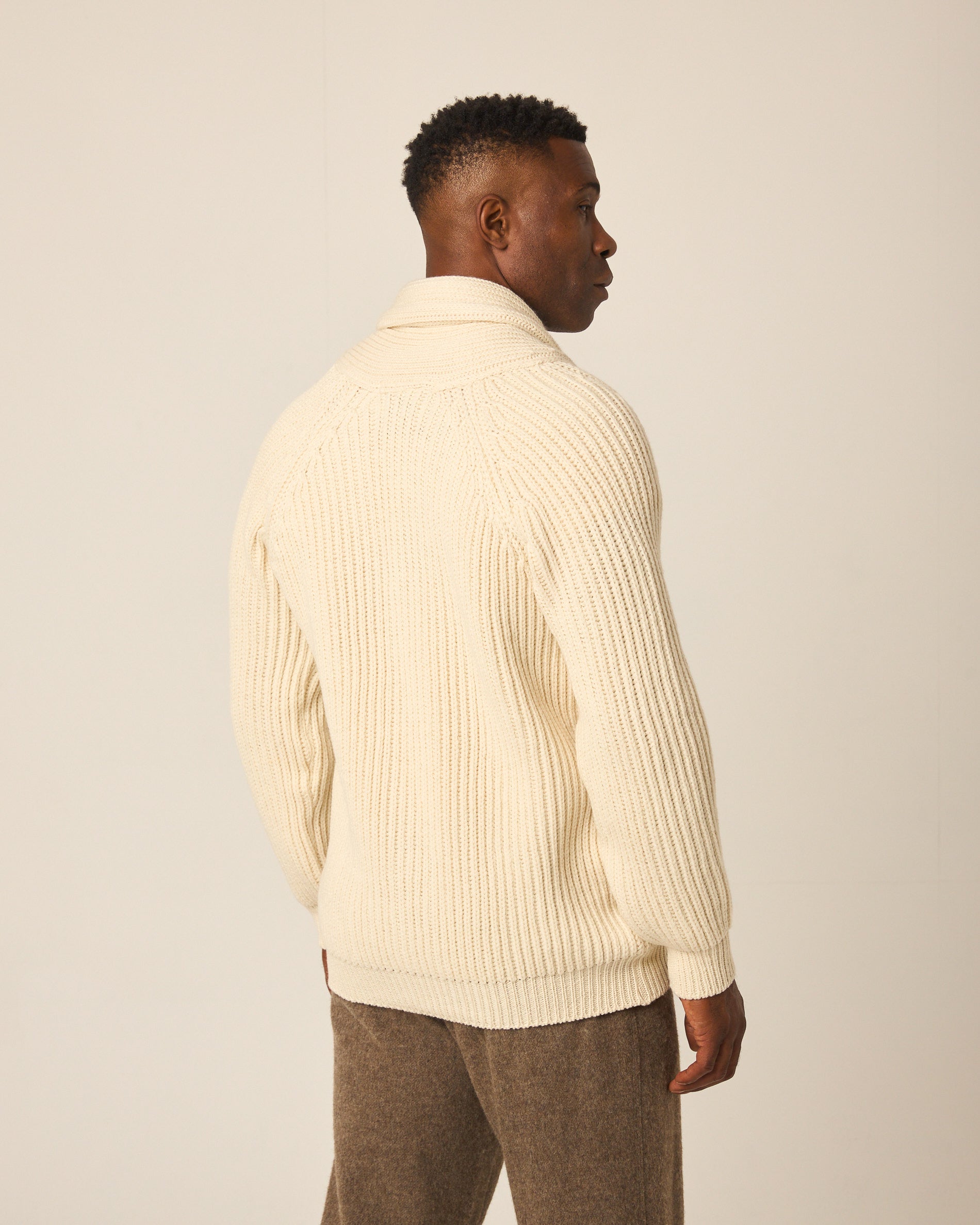 Image of model wearing Wilkinson Cardigan. Model is 6ft1in, chest size 38in and wearing size Large