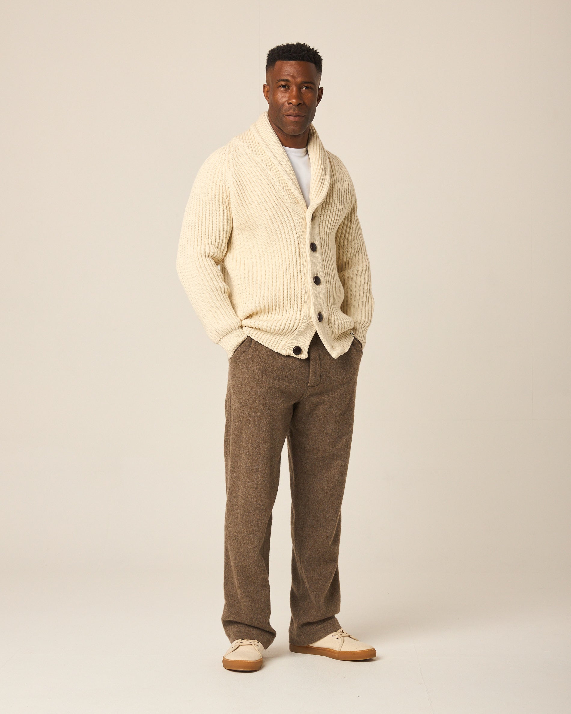 Image of model wearing Wilkinson Cardigan. Model is 6ft1in, chest size 38in and wearing size Large