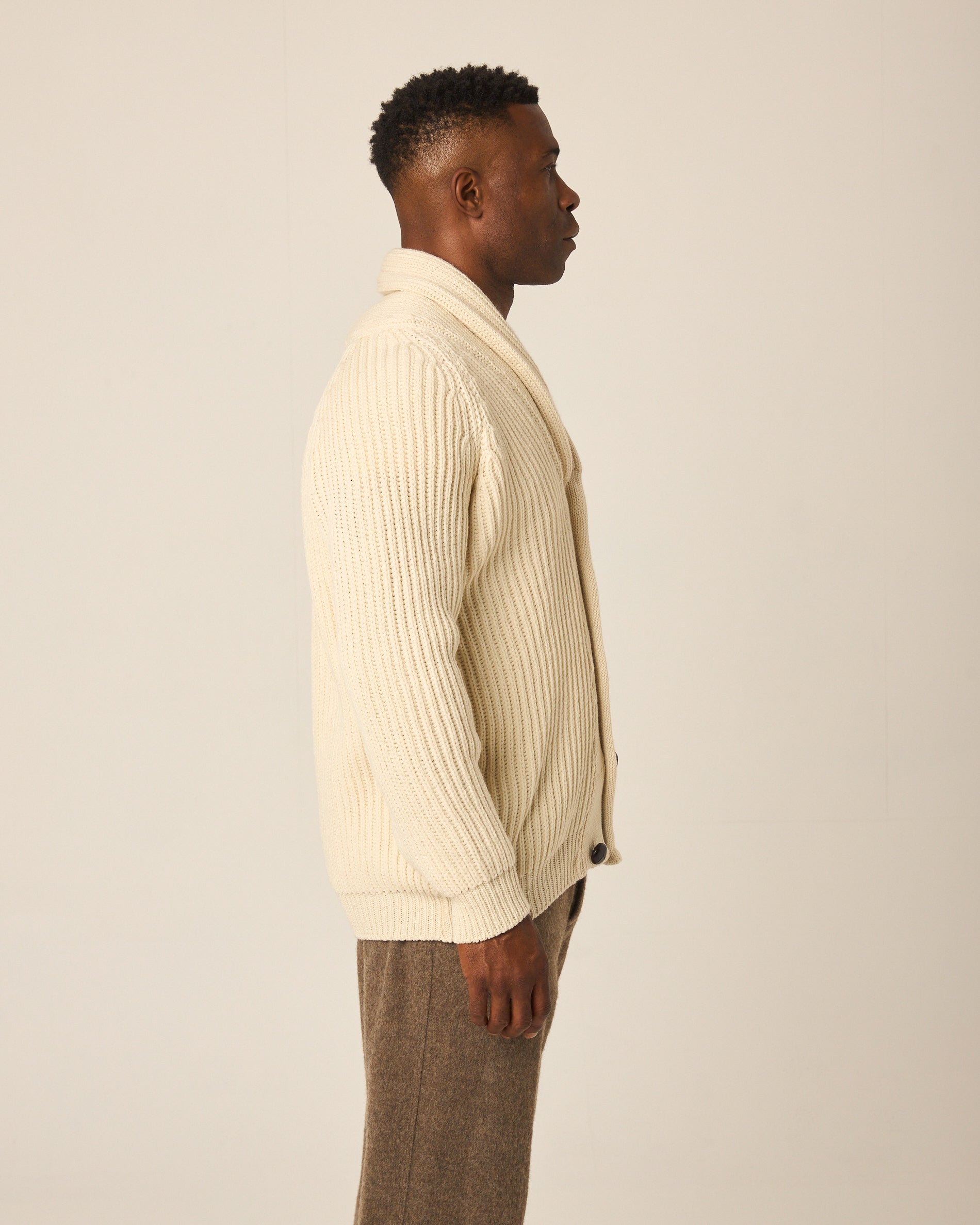 Image of model wearing Wilkinson Cardigan. Model is 6ft1in, chest size 38in and wearing size Large