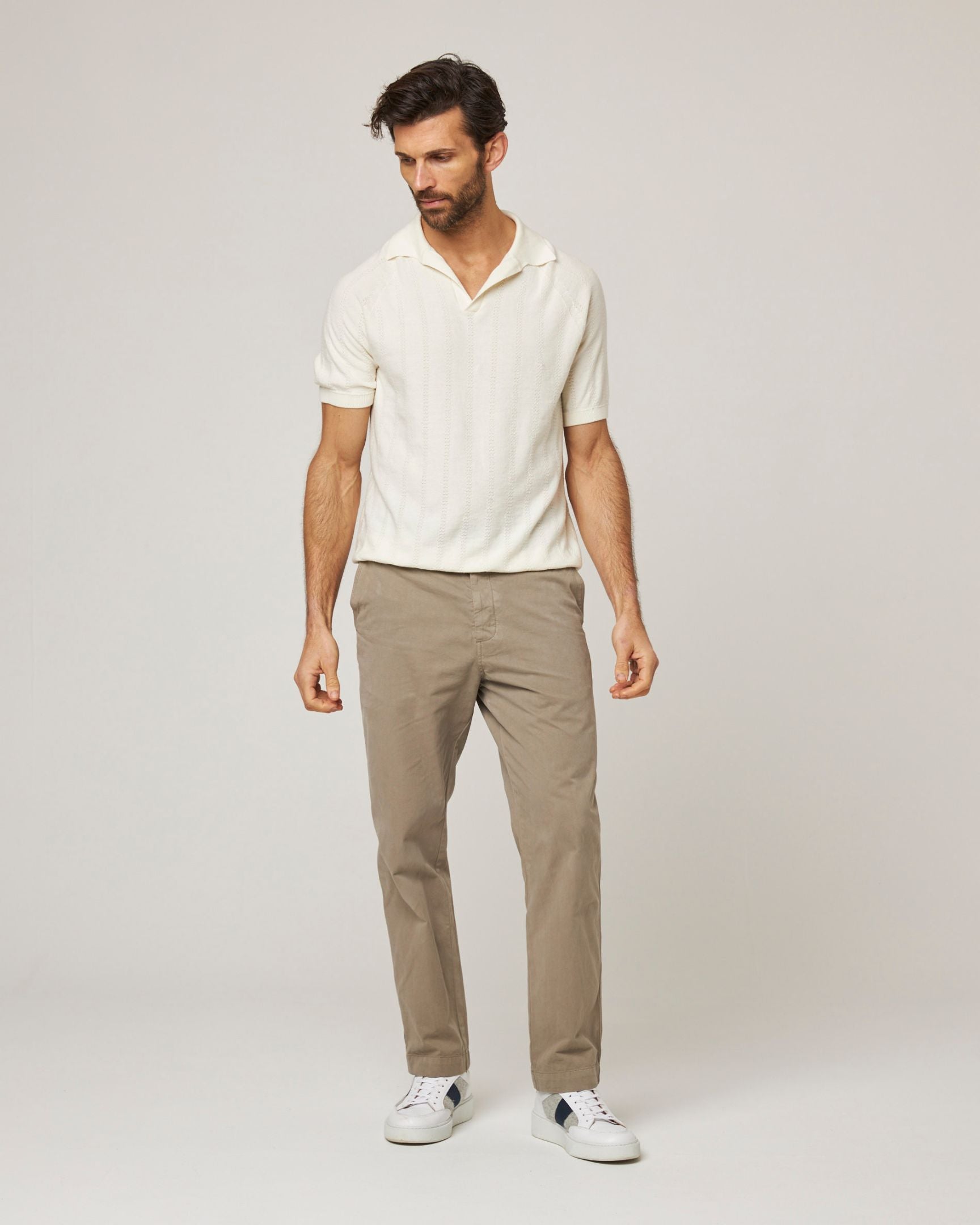 Image of model wearing Alma Polo shirt. 