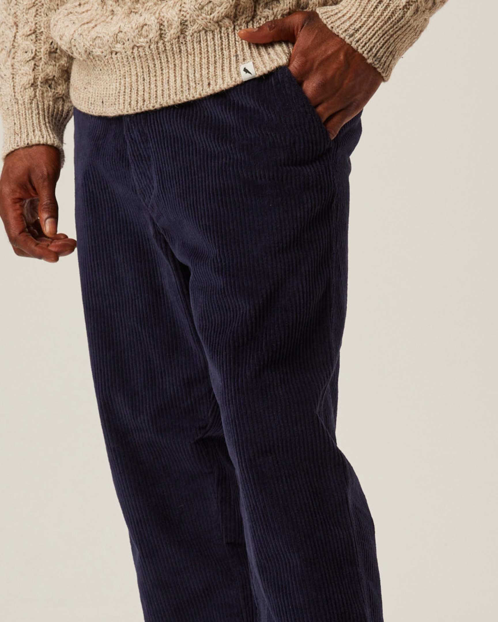 Image of model wearing Blake Corduroy Trousers. 