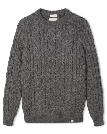 Image of model wearing Hudson Aran Jumper. Model is 6ft1in, chest size 38in and wearing size Medium
